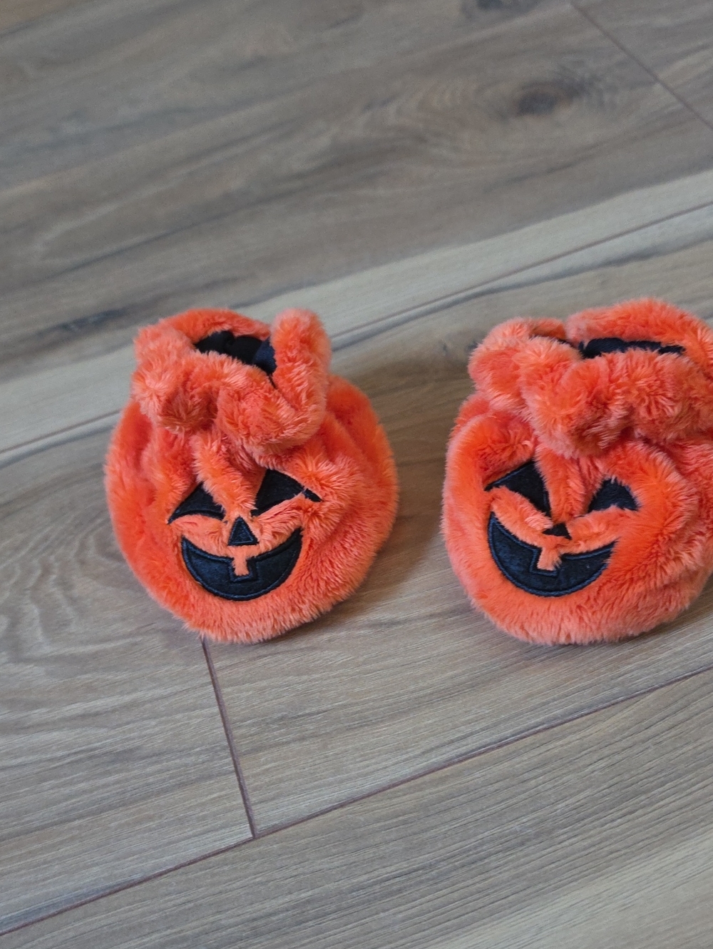 Orange Fuzzy Pumpkin Slippers with Jack-O'-Lantern Faces